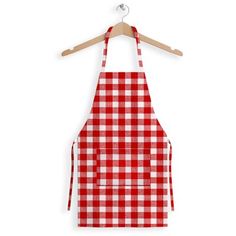 a red and white checkered apron hanging on a wooden hanger