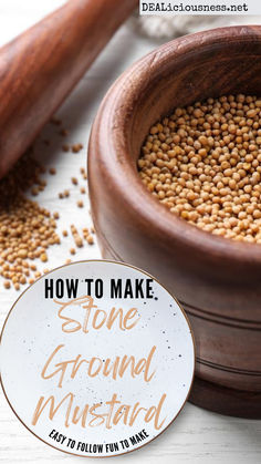 a wooden mortar bowl filled with grains and the words how to make stone ground mustard