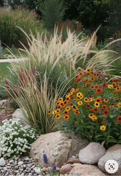 Rock Berm Landscaping, Rock And Flower Garden, Flower Bed Alternative Front Yards, Hardscape Flower Bed, Landscaping Along Property Line, Flower Beds With Rocks Landscaping Ideas, Front Yard Driveway Landscaping Ideas, Rick Flower Bed Ideas, Planting In Rock Beds