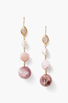 A romantic spirit animates these statement earrings. Tiers of moonstone, keshi pearls, purple mother of pearl roses and rounds sway from 18k gold plated sterling silver French hooks. A statement design perfect on its own or paired with dainty styles. 18k gold plated sterling silver. 3" drop. Handmade in Vietnam. Purple Pearl Earrings, Soft Summer Jewelry, Magpie Collection, Ideal Aesthetic, Dainty Style, Romantic Earrings, Unique Handmade Earrings, 30s Fashion, White Freshwater Pearl