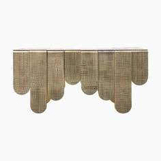 an art deco wall hanging made out of woven material