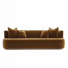 an image of a couch with pillows on it's back and two different colors