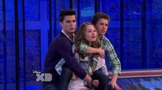 the young couple is hugging each other on the set of tv talk show, one direction