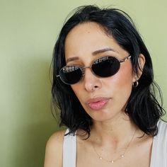 These mini oval sunglasses are your everyday classic. Featuring a silver metal frame with black lens. This style is unisex. True genuine vintage sunglasses from the 90s.  - 400 uv  - new vintage from the 90s - includes sunglasses pouch Metal Frame Sunglasses, 90s Sunglasses Vintage, Oval Sunglasses 90s, Vintage Oval Sunglasses With Mirrored Lenses, Retro Oval Sunglasses, Classic Oval Metal Frame Sunglasses, Vintage Metal Sunglasses With Tinted Lenses, Vintage Black Metal Sunglasses, Round Face Sunglasses