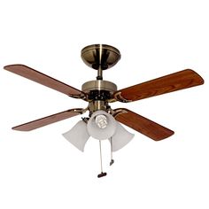 a ceiling fan with three wooden blades and two light shades on the top of it