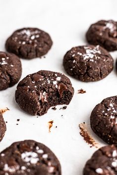 chocolate cookies with powdered sugar on top