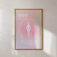 a pink poster hanging on the wall next to a window