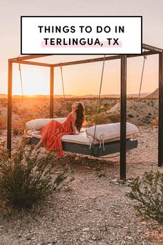 a woman sitting on a swing in the desert with text overlay that reads things to do in terlingua, tx