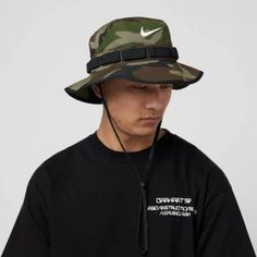 New Nike Dri-Fit Boonie Camo Bucket Hat Adult Unisex Bucket Camouflage Cotton Blend Polyester The Nike Boonie Bucket Hat Has You Covered With A 360-Degree Brim And A Drawcord That Cinches Down For A Stay-Put Fit When You're On The Move. Sweat-Wicking Power And Built-In Vents Team Up To Help Keep Your Head Dry And Cool. Camo Print Creates A Commanding Look. Product Details Smooth, Stretchy Durable Lightweight Fabric Dri-Fit Technology Wicks Away Unwanted Moisture Camo Printed Body Daisy Chain Tri Casual Camouflage Bucket Hat For Outdoor, Summer Camouflage Bucket Hat, Casual Camouflage Bucket Hat For Summer, Casual Wide Brim Camouflage Hat, Black Military Summer Hat, Casual Camouflage Bucket Hat, Casual Camouflage Hat With Flat Brim, Casual Camouflage Flat Brim Hat, Casual Flat Brim Camouflage Hat