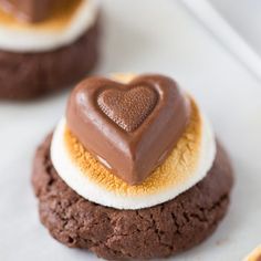 chocolate cookies with marshmallows in the shape of a heart