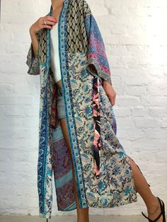 "This is free size patchwork robe made in vintage saree silk maxi long cover up with side splits and easy wrap tie closing perfect comfy daily duster with pockets can be worn on its own or layered over jeans and t shirt made free size length 55\" Thank You for looking" Bohemian Printed Kimono For Beach Cover-up, Bohemian Kimono With Boho Print For Beach Cover-up, Hippie Printed Kimono For Beach Cover-up, One Size Multicolor Boho Print Kimono, Hippie Wrap Kimono For Beach Cover-up, One Size Hippie Kimono For Festivals, Hippie Style One-size Kimono, Bohemian Long Kimono One Size, Long Patterned Kimono For The Beach