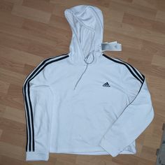 Nwt Adidas Hoodie. Slightly Cropped. White Winter Sweatshirt With Three Stripes Branding, Winter White Sweatshirt With Three Stripes Branding, White Hooded Sweatshirt For Athleisure, White Hooded Sweatshirt Athleisure Style, White Hooded Sweatshirt Athleisure, White Sportswear Sweatshirt With Three Stripes Branding, White Sports Hoodie With Adjustable Hood, White Three Stripes Sportswear Sweatshirt, White Three Stripes Branding Hoodie For Winter