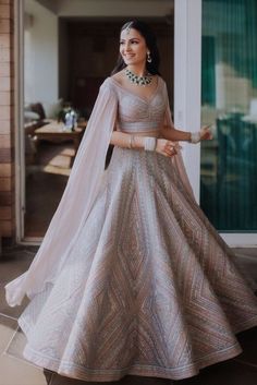 Bride twirling in a silver lehenga Lengha Blouse, Lehenga Design, Simple Lehenga, Paper Rings, Latest Bridal Lehenga, Navratri Dress, Reception Outfit, Desi Outfits