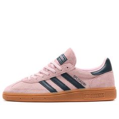 The adidas Handball Spezial Clear Pink Arctic Night is a stylish and comfortable sneaker that blends retro appeal with modern flair. Featuring a clear pink and arctic night color scheme, this shoe boasts a suede and leather construction for durability and a nostalgic aesthetic. The gum outsole enhances its retro charm, while the 3-Stripes and "Spezial" branding add a touch of adidas heritage. Spezial Shoes, Adidas Handball Spezial, Adidas Handball, Adidas Shoes Women, Adidas Spezial, Limited Edition Sneakers, Shoes Collection, Swag Shoes, Comfortable Sneakers