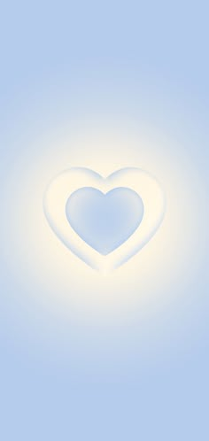 a white heart shaped object floating in the air on a light blue background with clouds