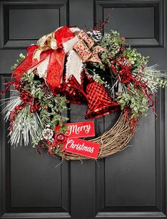 Bring the warmth of the Christmas season to your front door! This  Wreath created to decorate your entrance or fire Place with Holiday spirit!!  2 elegant Christmas bells surrounded by glittered and snow dusted greeneries, Pine corns  glittered red stems, with wooden "Mary Christmas" sign.  Multiple bows of red, gold and berry  ribbons, highlight the Christmas season.  Built on a  18" grapevine base  with leaves, dow and other items the complete wreath is about 23" height. depth is about 4"-6" (Approximately). Please note I always tie the wreath to the box using zip tie or wire tie to avoid damage during shipping. Be sure to carefully cut or remove the ties before you take the item out of the box. At the bottom of the box you will find 2 ties covered by small piece of tape. Thank you for p Elegant Christmas, Christmas Bells, Christmas Signs, Christmas Season, Christmas Seasons, Holiday Spirit, The Christmas