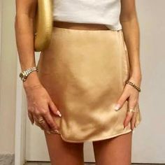 Brand New Never Worn Elegant Brown Skirt For Date Night, Chic Gold Mini Skirt, Chic Gold Skirt For Spring, Chic Gold Mini Length Bottoms, Elegant Gold Mini Skirt For Spring, Chic Solid Beige Skirt, Brown Mini Skirt For Date Night In Spring, Beige Mini Skirt For Summer Night Out, Beige Mini Skirt For Night Out