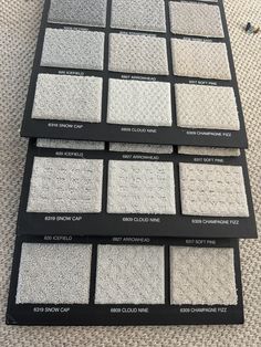 four rows of carpet samples are shown in black and white, each with different colors