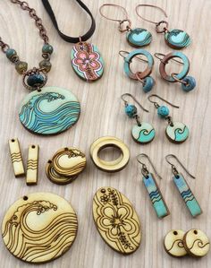 a collection of wooden jewelry sitting on top of a table