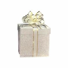 a white gift box with gold ribbon and bow