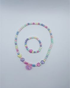 Gender: Girls Type: Necklace/Bracelet Material: plastic jewelry set Product Description: 1 necklace + 1 bracelet. *Jewelry set, colorful plastic material bead necklace, center of necklace has pink heart in delicate glitter, girls bracelets, girls birthday party jewelry gift. pattern/shape: love heart Occasion: party, birthday, gifts or any special occasion or as you like. Trendy Pink Plastic Necklaces, Trendy Pink Plastic Necklace, Multicolor Beaded Plastic Necklace, Cute Multicolor Plastic Necklaces, Multicolor Plastic Beaded Jewelry, Colorful Plastic Beads Jewelry, Pink Beaded Plastic Jewelry, Pink Plastic Round Bead Jewelry, Pink Plastic Round Beads Jewelry