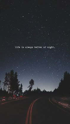 the night sky is filled with stars and there are trees in the foreground that says life is always better at night