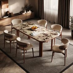 a dining room table with chairs and a vase on the floor in front of it