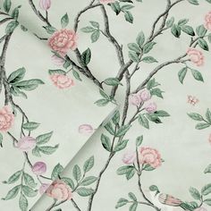 a wallpaper with pink flowers and green leaves on white paper, which has a bird sitting on the branch