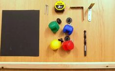 a wooden table topped with lots of different items