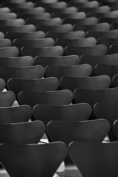 black and white photograph of rows of chairs