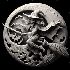 a carved image of a witch flying through the air with her broom in one hand