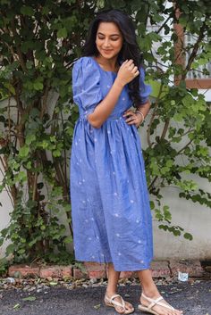 Rs.2400
Denim feel cotton dress with puffed sleeve. 

Model in the picture is wearing size S and length of the dress is 46 inches. Feeding Dresses, Simple Frock Design, Long Gown Design, Simple Frocks, Cotton Frocks