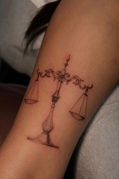 scales of justice tattoo! Balancing Scales Tattoo, Paralegal Tattoo, Scale Tattoo Minimalist, Law School Tattoo, Scales Of Justice Tattoo Fine Line, Balancing Scale Tattoo, Scale Balance Tattoo, Balanced Scale Tattoo, Balance Beam Tattoo