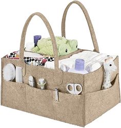 the baby's diaper caddy is filled with items