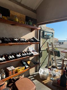 a room filled with lots of bottles and shelves