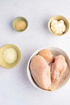 the ingredients for chicken are in small bowls