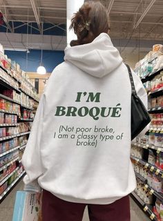 Don't overthink it! Inject some humor and positivity into your wardrobe with this funny sweatshirt that exclaims "I am broqué, not a poor broke, I am a classy type of broke." The sarcastic yet motivational phrase on this sweatshirt is a playful take on money matters, blending wit with retro vibes. With its minimalist design and vintage-inspired charm, this sweatshirt makes a great gift for anyone who enjoys a good laugh and a dose of affirmation.  Let it be a stylish reminder to embrace your uni Designer At Work, Graphic Sweatshirt Outfit, Sweatshirt Quotes, Back Print Design, Sweatshirts Aesthetic, Don't Overthink, Aesthetic Sweatshirt, Funny Gifts For Her, Sweatshirts Quotes