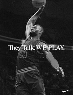 a black and white photo of a basketball player with the words they talk we play