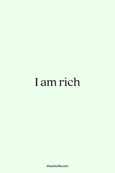 the words i am rich written in black on a light green background