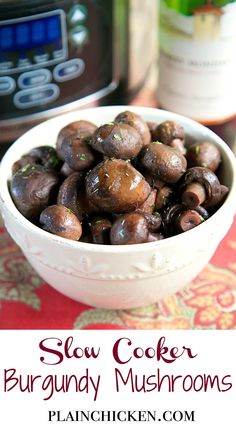 slow cooker burgundy mushrooms in a white bowl next to an instant pressure cooker