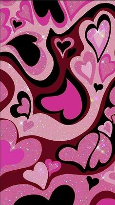 pink and black hearts with sparkles in the background