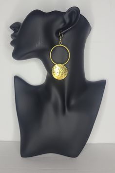 These earrings are hand crafted from brass material, which makes them a show stopper in the way they catch the light. They are bond to add some excitement to any outfit. Get a pair for yourself or as a gift to someone you love for special occasion or just because.  Details: - hand made - light weight - materials : brass - hook closure - clear rubber stopper Gold-tone Brass Jewelry For Gifts, Gold-tone Brass Jewelry As A Gift, Gold Nickel-free Plug Earrings For Party, Nickel-free Gold Plated Circular Earrings, Nickel-free Gold-plated Circular Earrings, Nickel Free Gold Plated Circle Earrings, Yellow Gold Circle Brass Earrings, Yellow Gold Circle Earrings In Brass, Teardrop Metal Clip-on Earrings For Gift