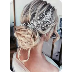 a woman wearing a bridal hair comb