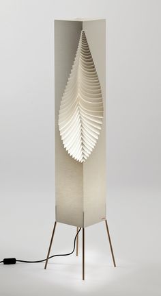 a lamp that is shaped like a leaf