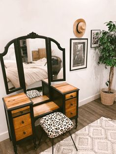 a bedroom scene with focus on the dressing table and stool, which has a leopard print footstool