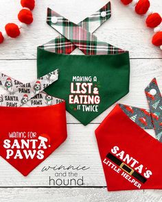 Photo of three reversible tie on Christmas dog bandanas, sewn and sold by Winnie and the Hound. One bandanas says "Waiting for Santa Paws" on a red fabric and reverses to a Santa Paws print. The second tie on dog bandana says "Making A List and Eating It Twice" on green fabric and reverses to a Christmas plaid. The third bandana says "Santa's Little Helper" on red fabric that reverses to a winter scene of red cars and Christmas trees. Shop all of our pet accessories at winnieandthehound.com Dog Boutique Ideas, Dog Harness Pattern, Bandana Crafts, Fun Phrases, Dog Accesories, Dog Thanksgiving, Dog Xmas, Fun Sayings