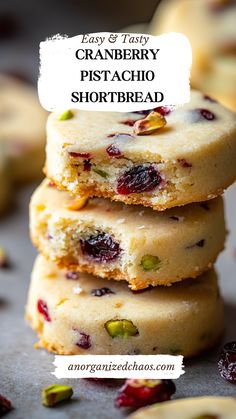 cranberry pistachio shortbread cookies stacked on top of each other