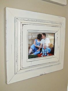 a white frame with an image of two children on it