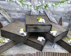 several pieces of wood with flowers on them