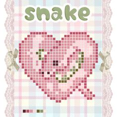 a pink heart with the words snake on it's side, in front of a plaid